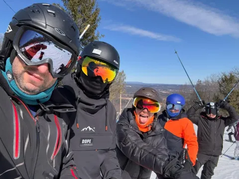 Helen and her family skiing